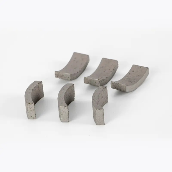 Core drill bit segments for reinforced c